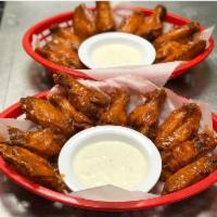 Chicken Wings · Traditional bone in chicken wings with your flavor choice of PLAIN, MILD, HOT or BBQ. Served...