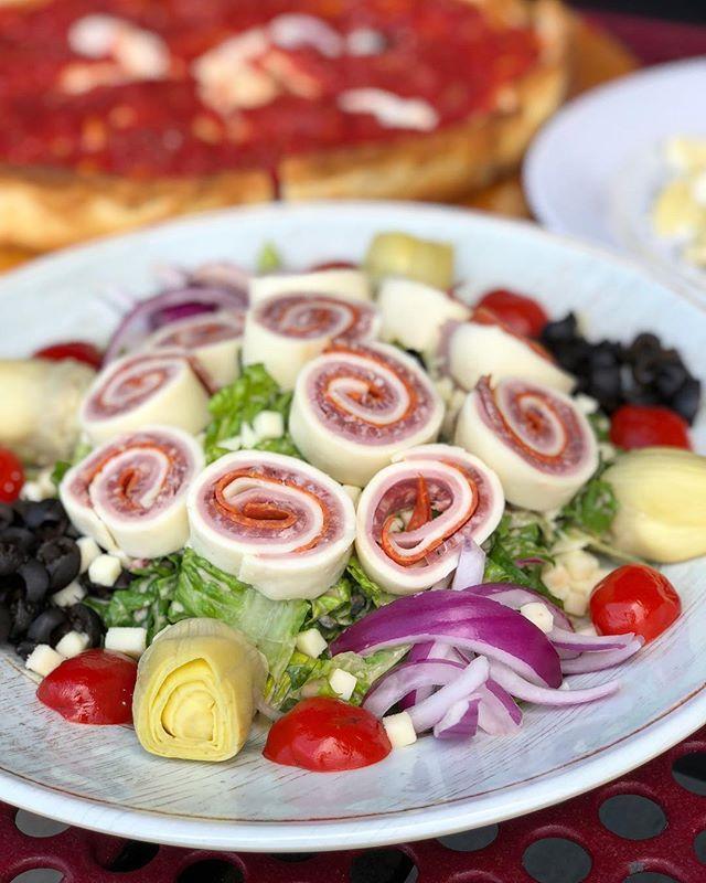 Antipasto Salad · Lettuce, red onions, black olives, diced mozzarella, pepperoncini, tomatoes, artichoke hearts, peppers, ham, salami and pepperoni.