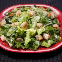 Caesar Salad · Mixture of Romaine and Iceberg lettuce topped with Parmesan cheese, & croutons with our spec...