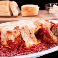 Homemade Lasagna Dinner · Layers of pasta and ricotta cheese with meat filling topped with marinara sauce, then baked ...