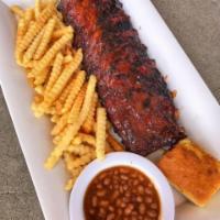 BBQ Baby Back Ribs · Full slab served with French Fries, Cornbread and Baked Beans. **No substitutions on sides**