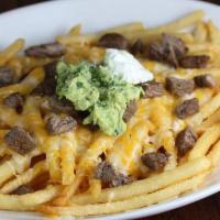 ASADA FRENCH FRIES · French fries with carne asada, grilled onion, tomatoes, and jalapenos