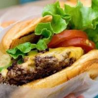 Cheeseburger · Delicious 1/4 lb. hamburger and cheese with all the American flavor.