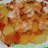 Camarones Tropicales · Ten shrimp cooked with orange and white wine.