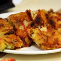 Seafood Pancake · Squid, shrimp and grilled onions fried in batter.