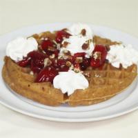 Deluxe Waffle · Served with your choice of strawberry, blueberry, cinnamon apple, caramel banana pecan or pe...