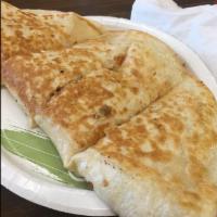 Ham and Cheese Quesadilla · Includes salsa and hot sauce. 