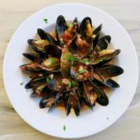Mussels and Clams Posillipo · Sauteed with clams, shallots, white wine and light tomato broth.