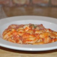 Orecchiette Pasta · Sausage, fennel ragu, broccoli rabe and cherry tomatoes.