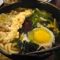 S8. Shrimp Tempura Udon Soup · Udon noodle soup with shrimp tempura.
