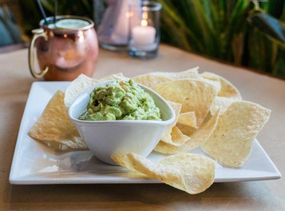 Guacamole · Made to Order with Onions, Jalapenos, Tomatoes, Cilantro & Lime