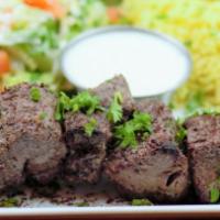 Beef Shish Kebab · Cubes of tender juicy top sirloin beef marinated to a flavorful delight grilled over wood fi...