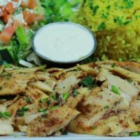 Chicken Shawarma Platter · Thinly sliced chicken breast marinated in house spices roasted on vertical spit served with ...
