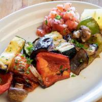 Vegetables a la Parrilla · Grilled zucchini, eggplant, mushrooms, onion, red and green bell peppers.