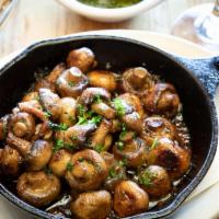 Sarten de Champignons · Skillet of sauteed mushrooms in white wine, parsley and garlic.