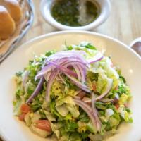 Mixta Salad · Lettuce, tomato and onion tossed with our house dressing.