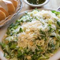 El Cesar Salad · Fresh romaine and iceberg lettuce, Parmesan cheese and croutons tossed in classic Caesar dre...