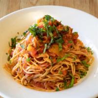 Cabello de Angel Pasta · Angel hair pasta, tossed with olive oil, fresh tomato, basil & garlic in a tomato sauce with...