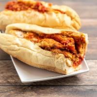 Chicken Cutlet Parmigiana Sub · Home made chicken cutlet with marinara sauce,provolone cheese and parmigiana cheese .