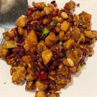 Stir Fried Chicken with Roasted Chili Peanuts · Spicy.