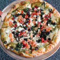 Veggie Pesto Pizza · Spinach, tomatoes, mushrooms, roasted red peppers, mozzarella cheese, black olives and feta....