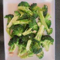 Broccoli · Broccoli stir fried with oyster sauce and fried garlic.