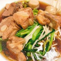Pork Rib Noodles Soup · Pork ribs boiled in soup with rice noodles, pork ball, ong choy and bean sprouts