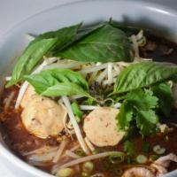 N6. Boat Noodle · Rice noodle with choice of meat, meatball and bean sprout in pork broth. Spicy.