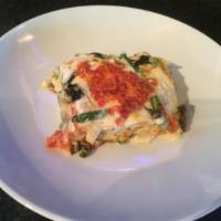 Veggie Lasagna · Vegetable mix (peppers, zucchini, asparagus, tomatoes, mushrooms) bechamel sauce topped with...