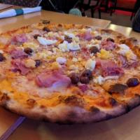 Venezia Pizza · Portuguesa. Tomato sauce, mozzarella, ham, kalamata olives, and fresh onions topped with a h...