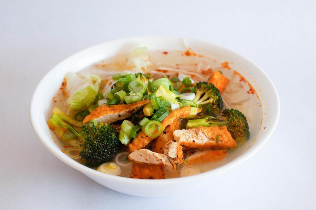 Tofu Noodle Soup · Lemongrass tofu, rice noodle, iceberg lettuce, Thai basil, bean sprout, green onion, broccoli and vegetable broth.