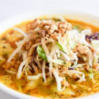 Turmeric Noodle Soup · Shrimp, chicken, pork, tofu, rice noodle, turmeric, mixed vegetable, roasted peanut, green o...