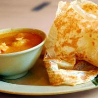 Homemade Roti Canai · Indian pancake. Malaysian all-time favorite, crispy style pancake with a curry chicken and p...