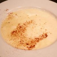 Lobster Bisque · A thick, cream based soup mixed with lump lobster meat, shallots and drizzled with extra vir...
