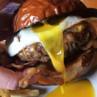 Breakfast Burger · Crispy bacon and cheddar cheese topped with a fried egg.