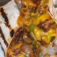Angus Fajita Wrap · Fresh ground Angus, sauteed peppers and onions, cheddar, cilantro and a blend of Mexican spi...