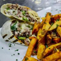 Philly Cheeseburger Wrap · Fresh ground Angus with mozzarella, Parmesan, caramelized onions, sliced mushrooms, red pepp...