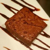 Fudge Brownie · Decadent Chocolate Chip Brownie Made w/ Authentic Belgian Milk Chocolate. Complimented By a ...