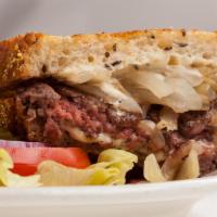Patty Melt · 1/3 lb. hamburger patty with melted Swiss and grilled onions on marble rye. Served with choi...