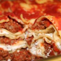 Lasagna · Served with NYC garlic knots or garlic bread.