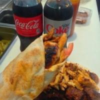Chicken Kebob Platter · Served with pita bread, house salad, choice of rice or fries and choice of hummus, tahini sa...