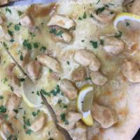 Chicken Francese Pizza · Comes with lemon sauce.