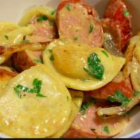 Chef's Pierogi · Sauté potato & cheese pierogi smothered with red smoked sausage, mushrooms & caramelized oni...
