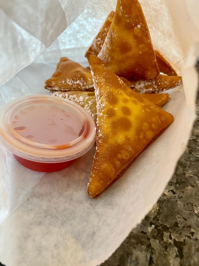 6 Pieces Cream Cheese Wontons · Crispy wontons stuffed with sweet cream cheese filling.