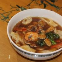 Wor Wonton Soup · Special soup with prawn, chicken, beef, vegetable stir fry layered in chicken broth and pork...