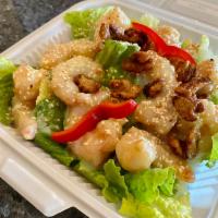 Honey Walnut Prawns · Hand battered and tossed in our sweet honey cream sauce and candied walnuts
