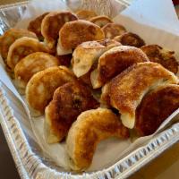 Potstickers · 24 pieces. Made with pork