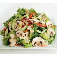 12. Garden Salad · Romaine, tomatoes, celery, carrots, cauliflower, mushroom and cucumber. 
