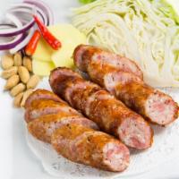 A10. Isan Sausage · 3 pieces. Thai deep fried sausage fermented pork and glutinous rice. Nut allergy.