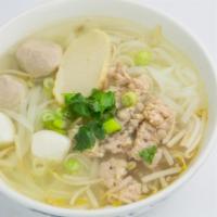 35. House Noodle Soup · Rice noodles, pork ball, fish ball, fish cake, ground chicken, bean sprout, peanut, green on...
